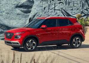 A parked, red 2022 Hyundai Venue. | Hyundai dealer in North Little Rock, AR.