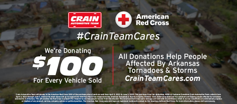 Crain Automotive Team donates $100 per vehicle sold to the American Red Cross for Arkansas tornado and storm relief, with background image of a damaged neighborhood.