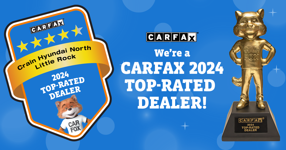 Carfax graphic celebrating Crain Hyundai of North Little Rock as a 2024 Top-Rated Dealer, featuring the Car Fox trophy and five-star badge on a blue background.